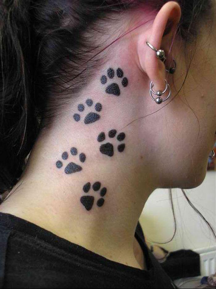 dog paw print tattoo on Neck