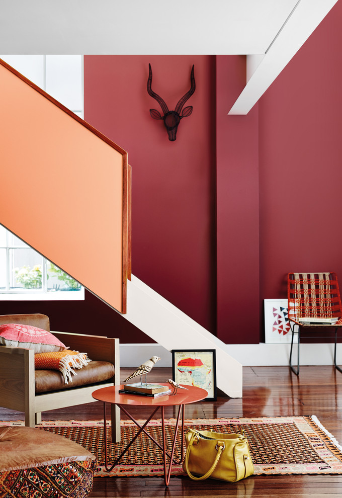 Living Room Staircase With Beautiful Red Wall