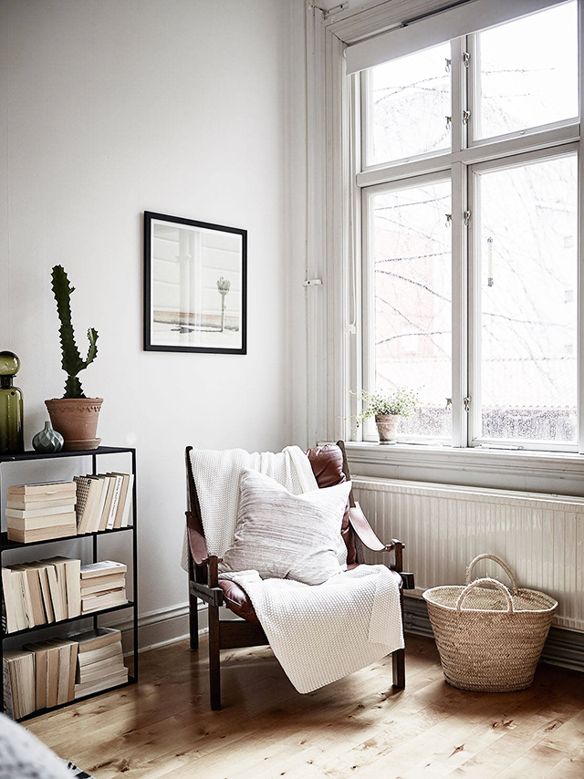 small bedroom corner chair near window