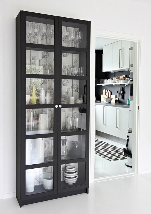 Decorate black cabinet with wallpaper