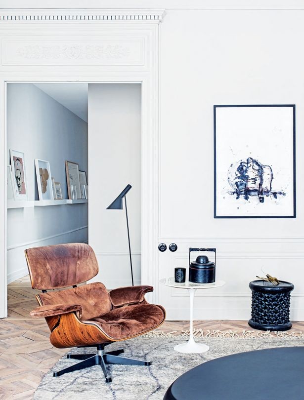 sitting room Moroccan stool With Eames Lounge chair