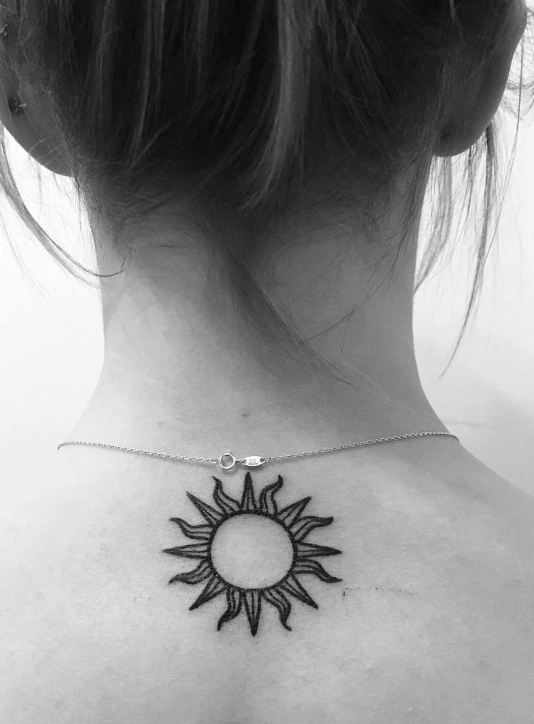 Sun Tattoo on Back of Neck