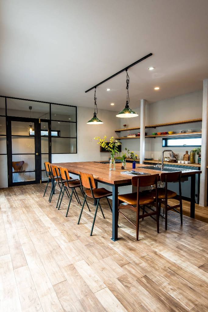 Kitchen With Wood Floor And Dining