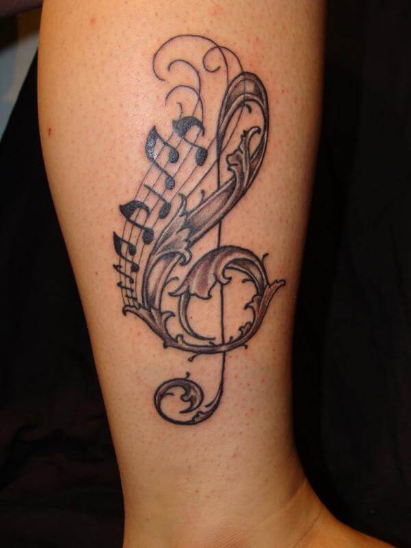 Arm Music Notes Cassette With Swirls Black Grey Forearm Tattoo
