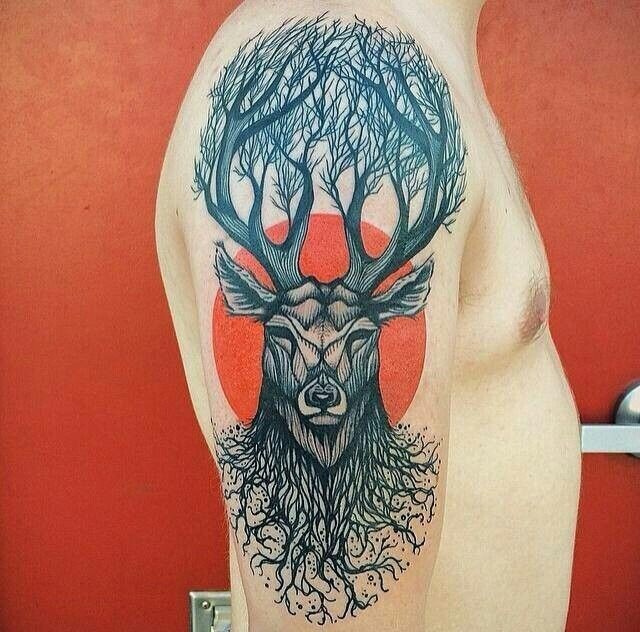 Big Black Ink Upper Arm Deer Tree-Themed Tattoo