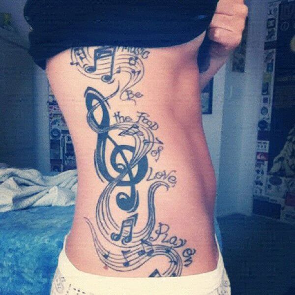 Simple Rib Side With Music Notes And Text Tattoos