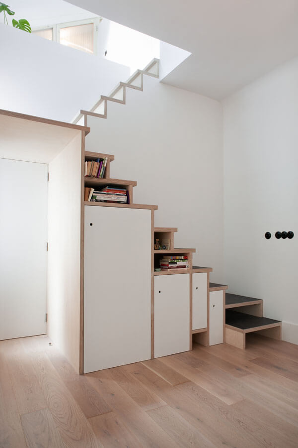 Space Saving Plywood Staircase Storage Design