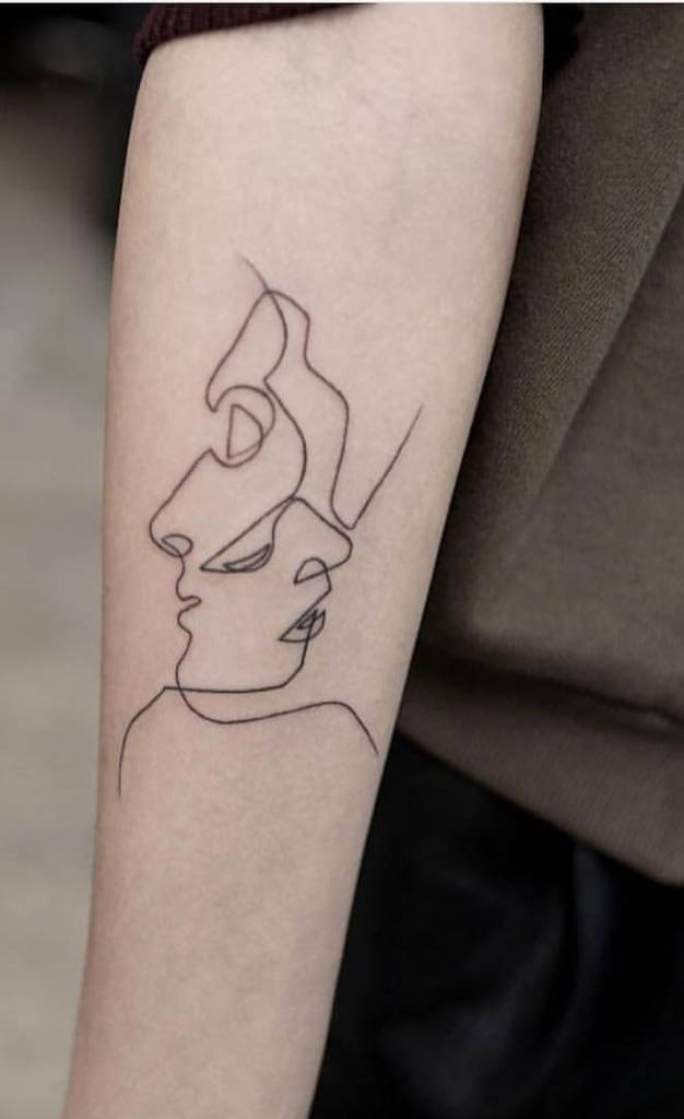 Two-Face Line Tattoo on Hand