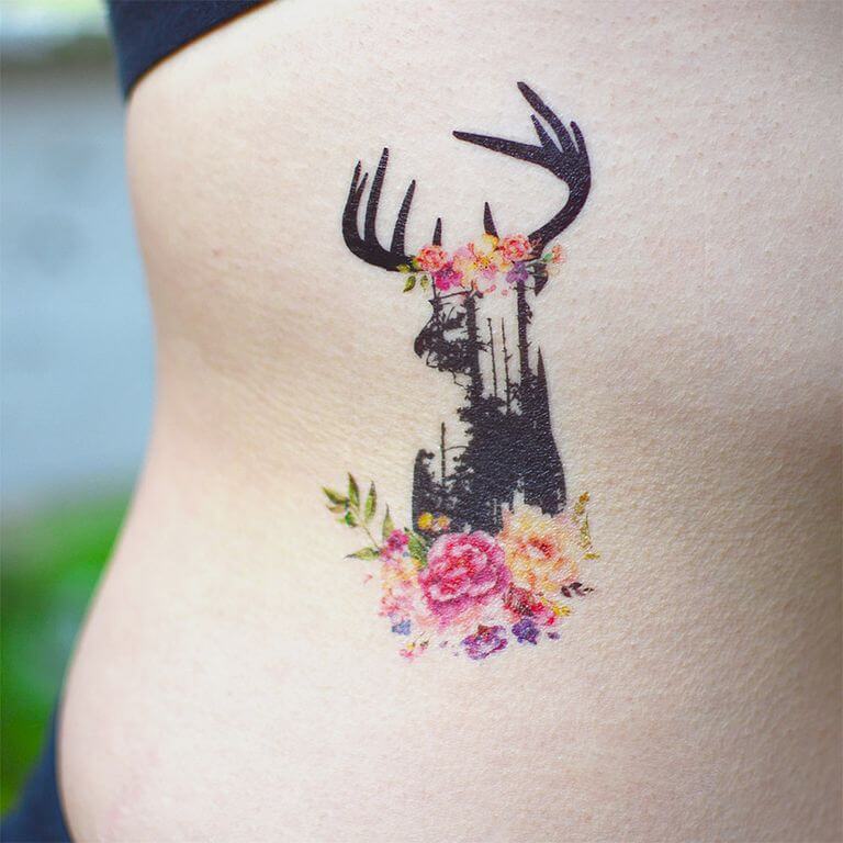Watercolor Flower Deer Tree-Themed Tattoo Design on Girls Rib