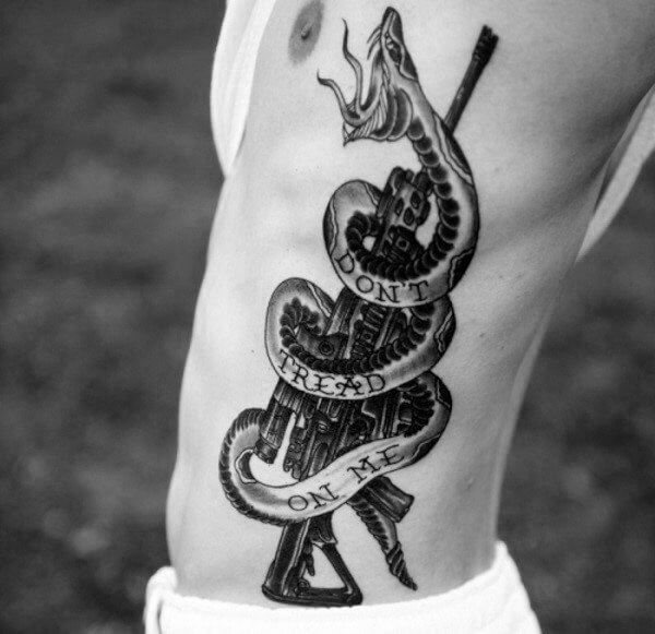 Assault Rifle Angry Snake Black Ink Tattoo with Dont Tread on me Text on Guys Side