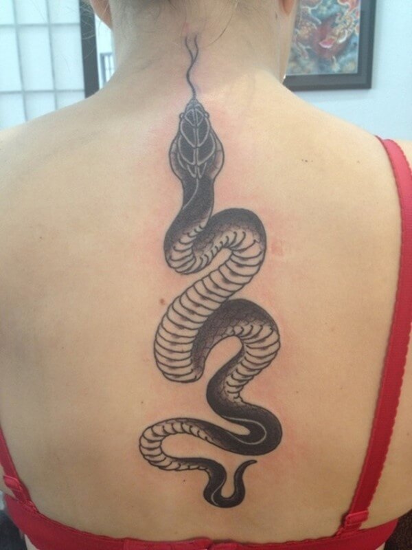 Black Ink Snake Tattoo on Women Upper Back
