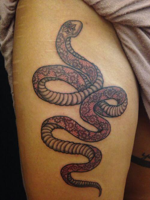 Lovely Pinkish snake Tattoo on Thigh with Amazing Floral Pattern