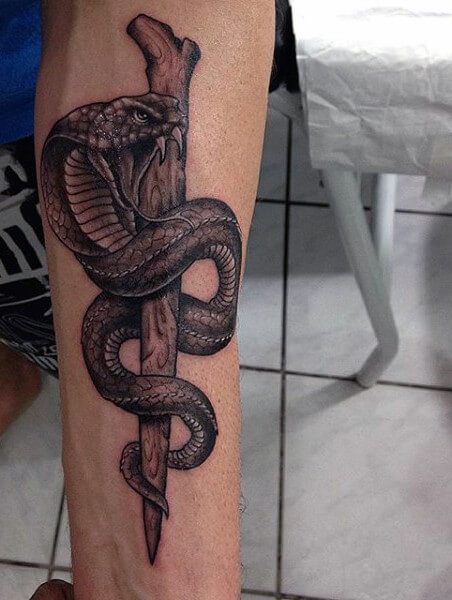 Snake Surround Wood Dagger Tattoo