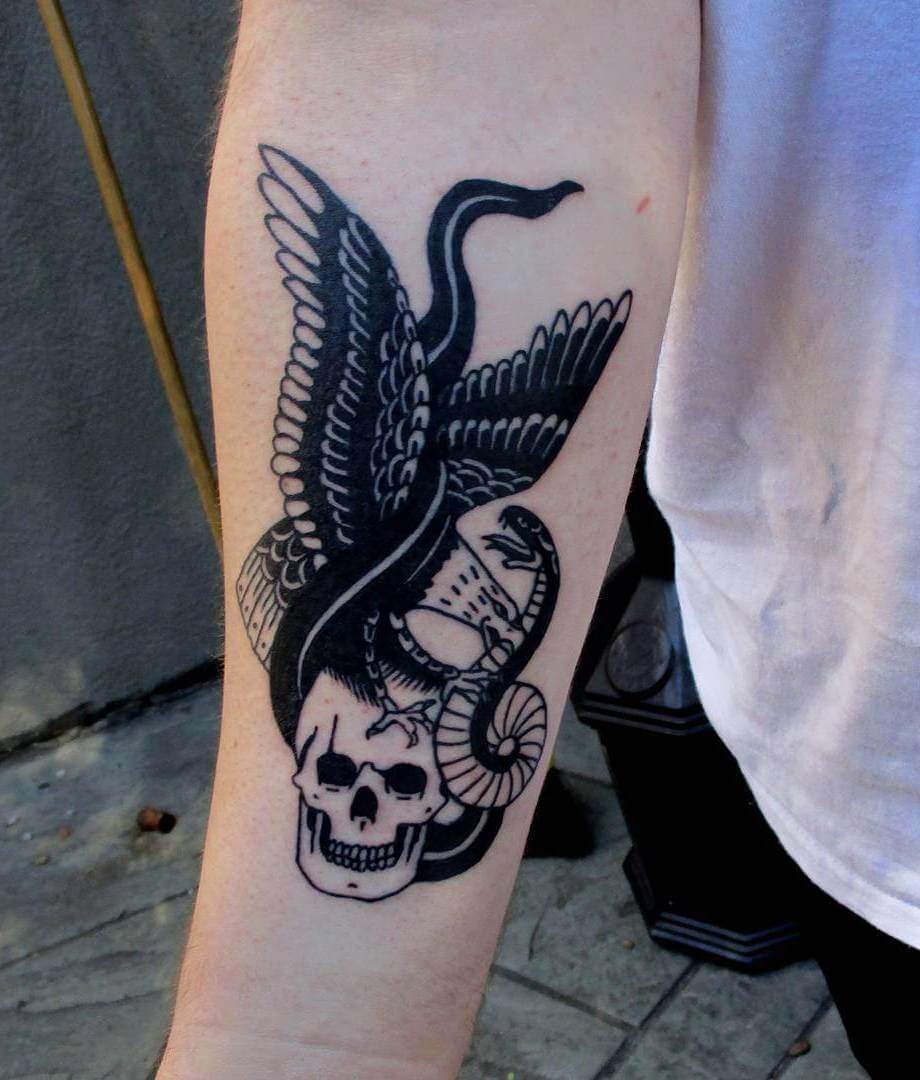 Snake with Skull Tattoo on Slave
