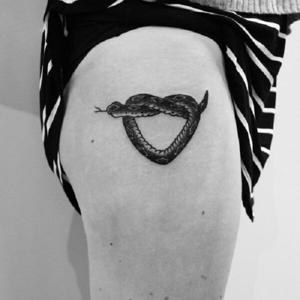 Tiny Hearted Snake Tattoo on Thigh