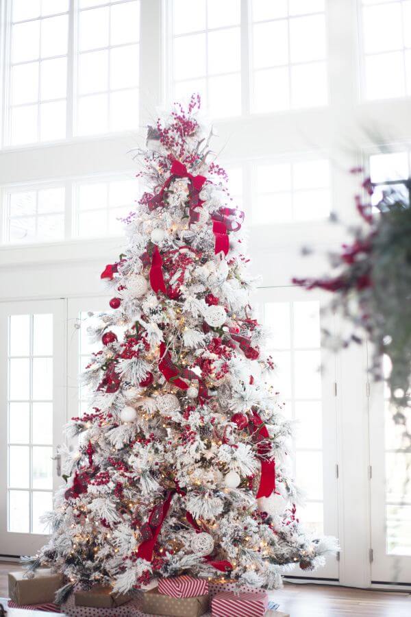red and white frosted christmas tree