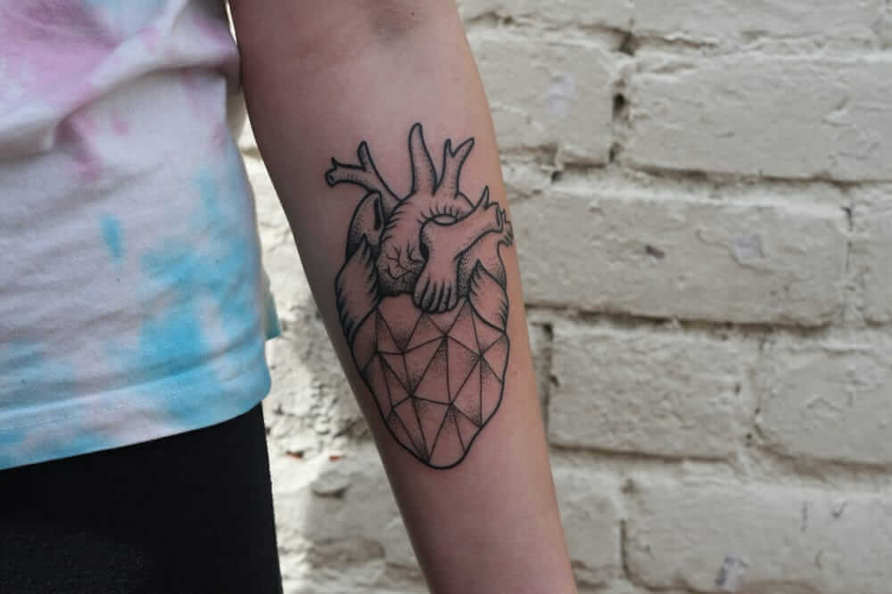 Anatomical Heart Tattoo on Hand