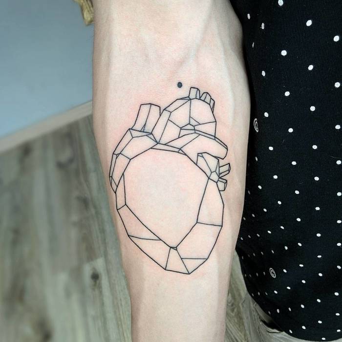 Anatomical Heart Tattoo on Inner Forearm