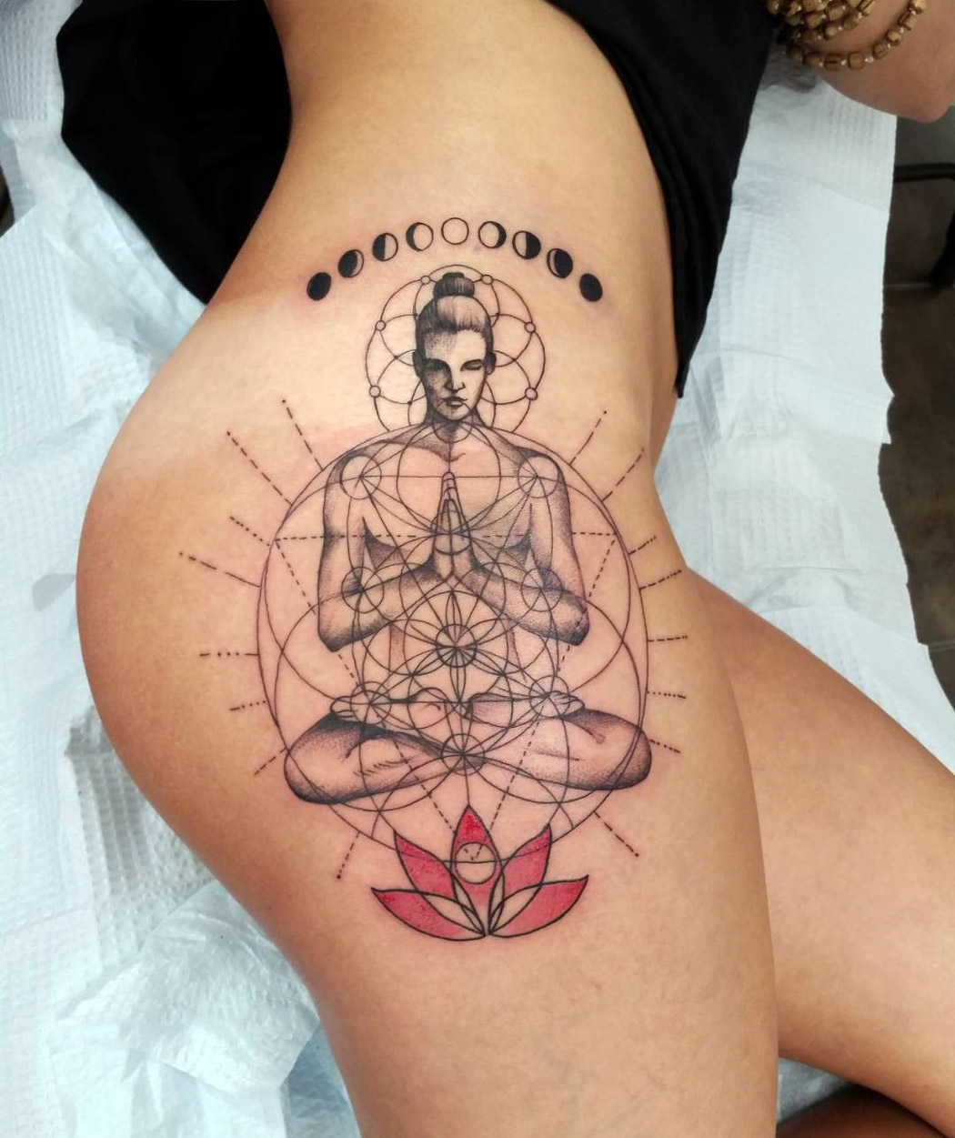 geometric lotus tattoos