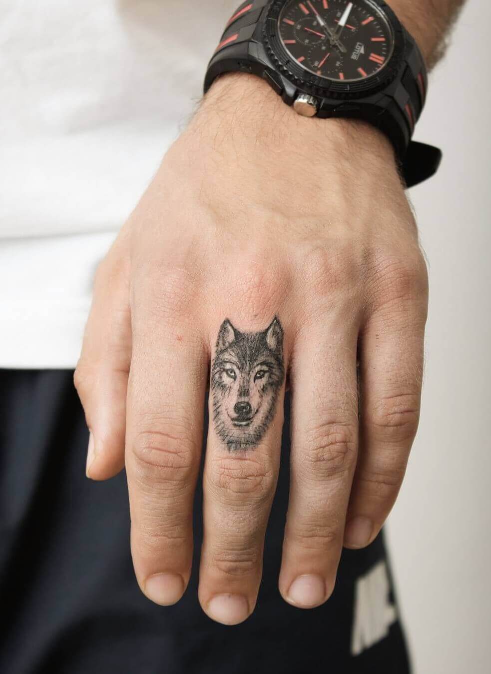 Finger Wolf Tattoo
