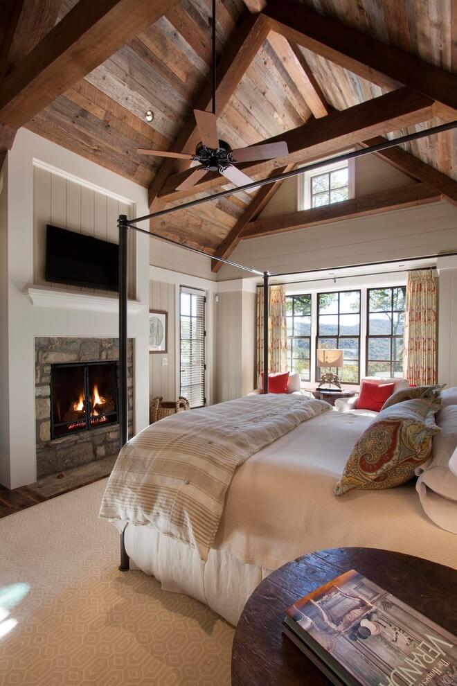 Built-In Fireplace In Rustic Bedroom