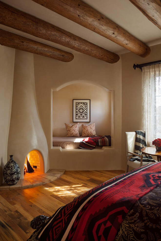 Southwestern Bedroom With Corner Fireplace