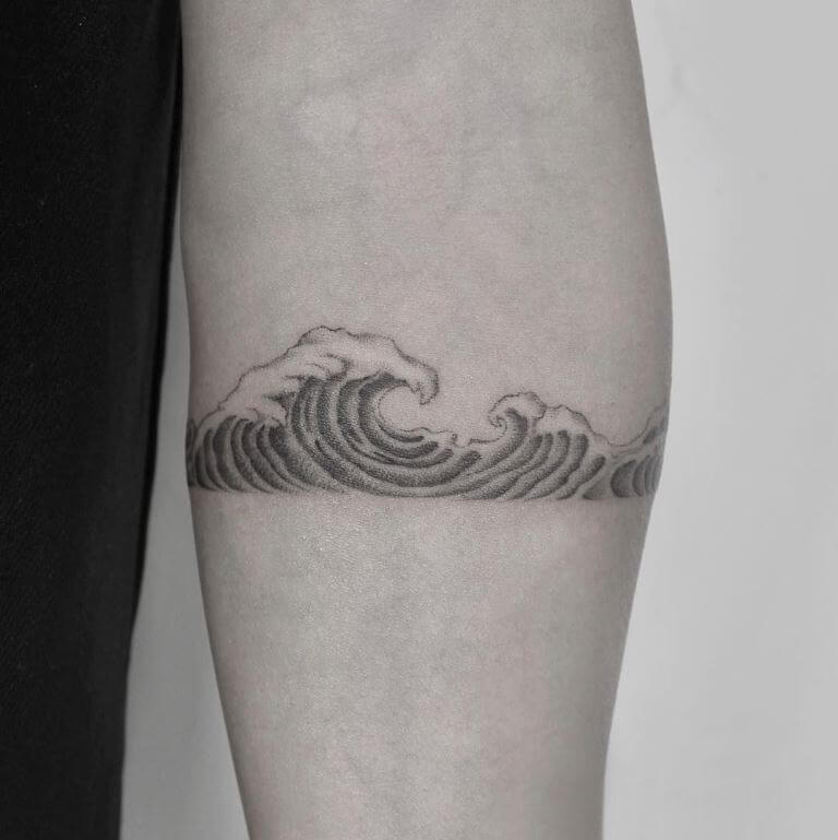 30 Most Attractive Ocean Wave Tattoo Design Ideas