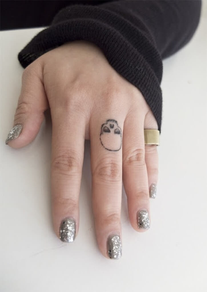 Minimalist Finger Skull Tattoo