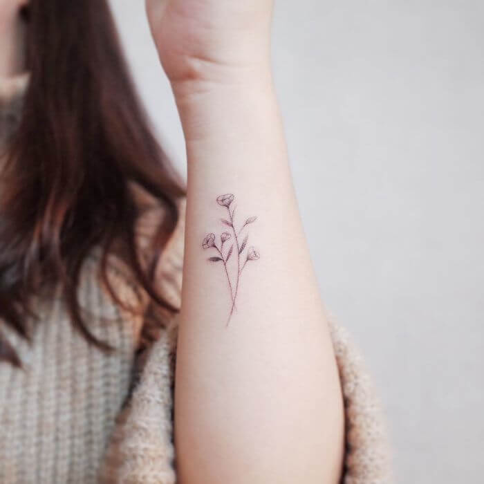 Minimalistic Floral Tattoo Design