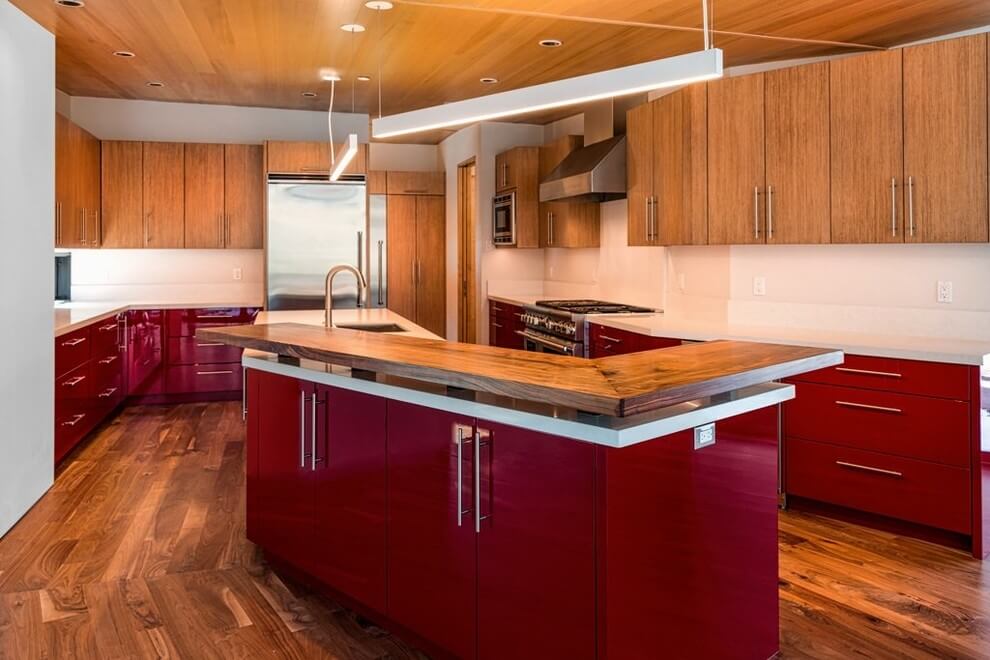 Expansive Dark Red and Wood Kitchen
