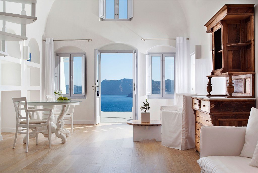 Stunning Hallway Design at Katikies Hotels in Oia Applied White Oak Floor and White Wall Decor White Fabric Sofa